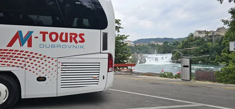 Rear view of a touring coach at a viewpoint